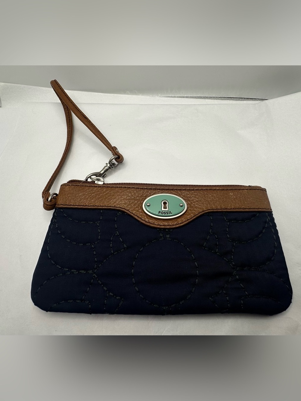 Fossil Navy and Tan Quilted Wristlet with Keyhole Plaque